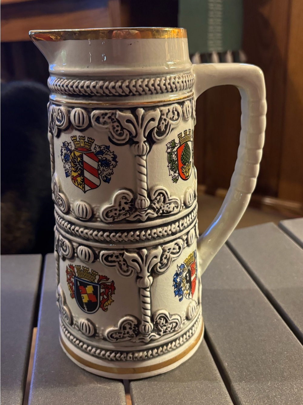 Vintage German-style coat of arms ceramic beer stein or tankard